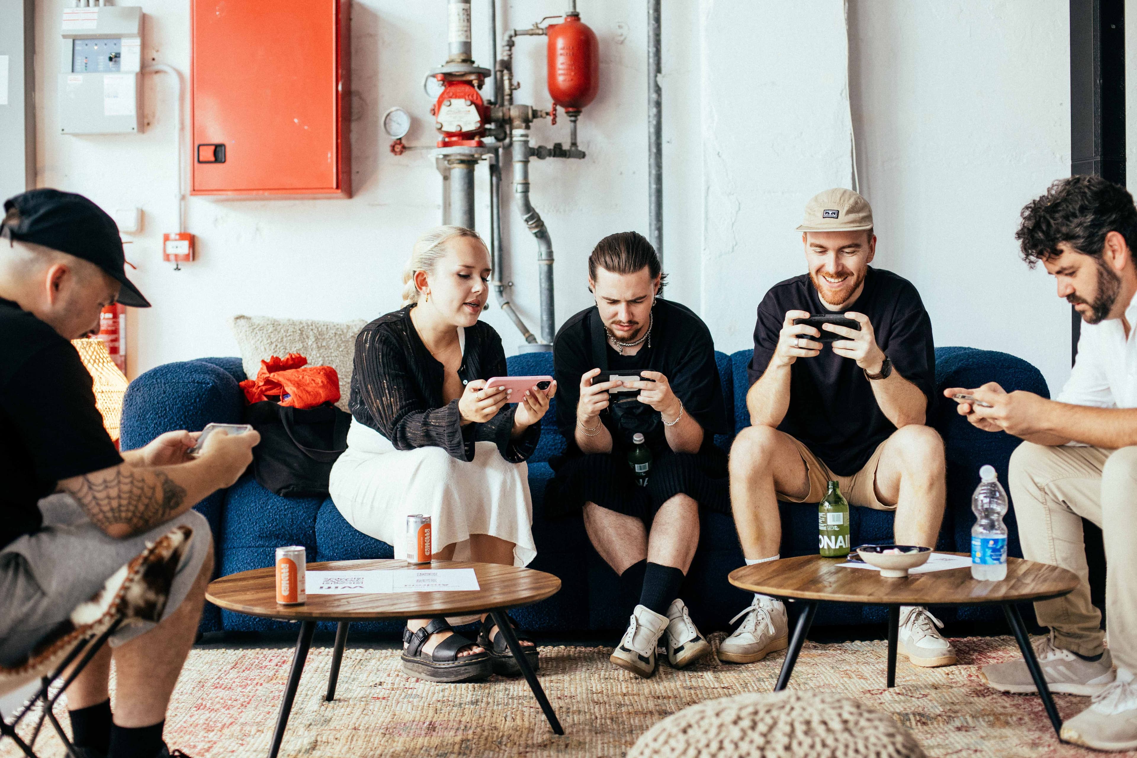 Players gathered around screens at the event